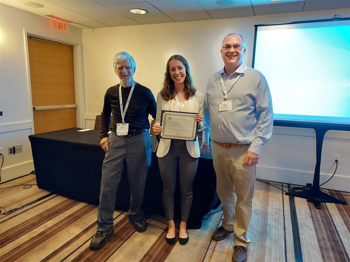 Colleen Patton received the 2022 PPTG Student Paper award. With her advisors Chris Wickens (left) and Ben Clegg (right)